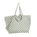 Green and white checkered Nestling tote style beach bag on a white background