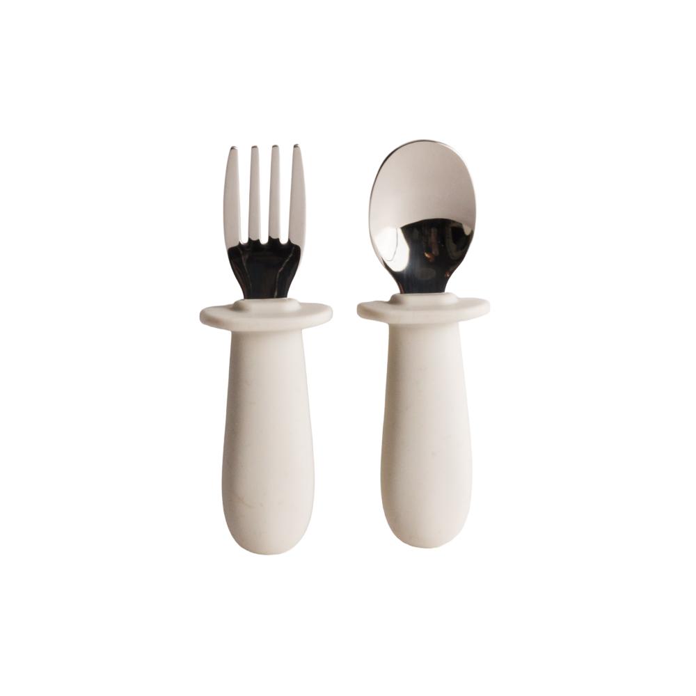 Set of Nestling oat baby cutlery, fork and spoon, on a white background