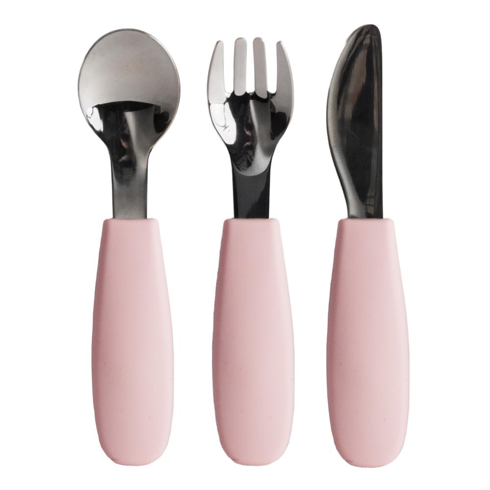 Set of three pink-handled Nestling toddler cutlery on a white background