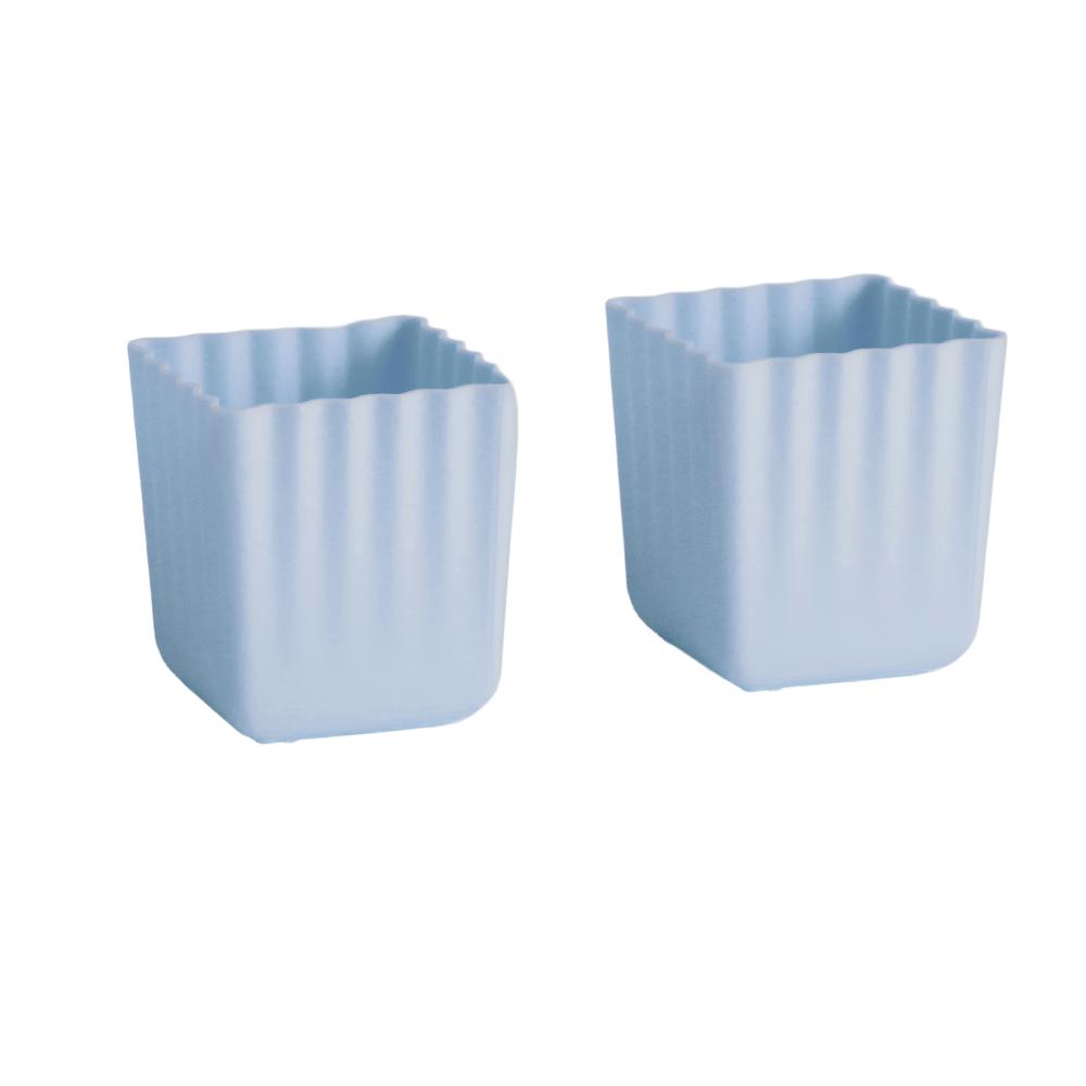 2 large blue silicone cups on a white background