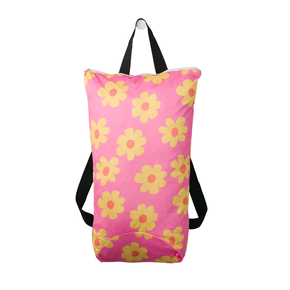 Large Swim Wet Bag in a pink Daisy print on a white background