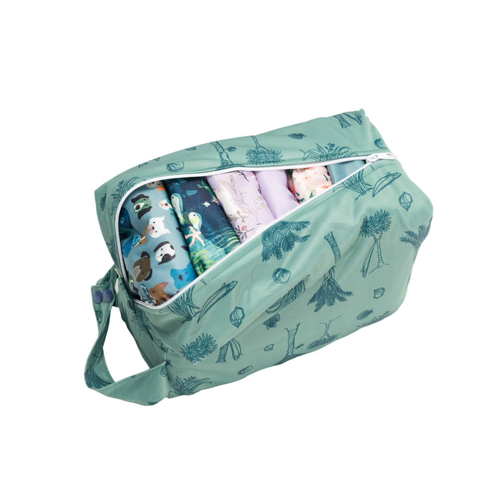 Green nappy pod with containing nappies on a white background
