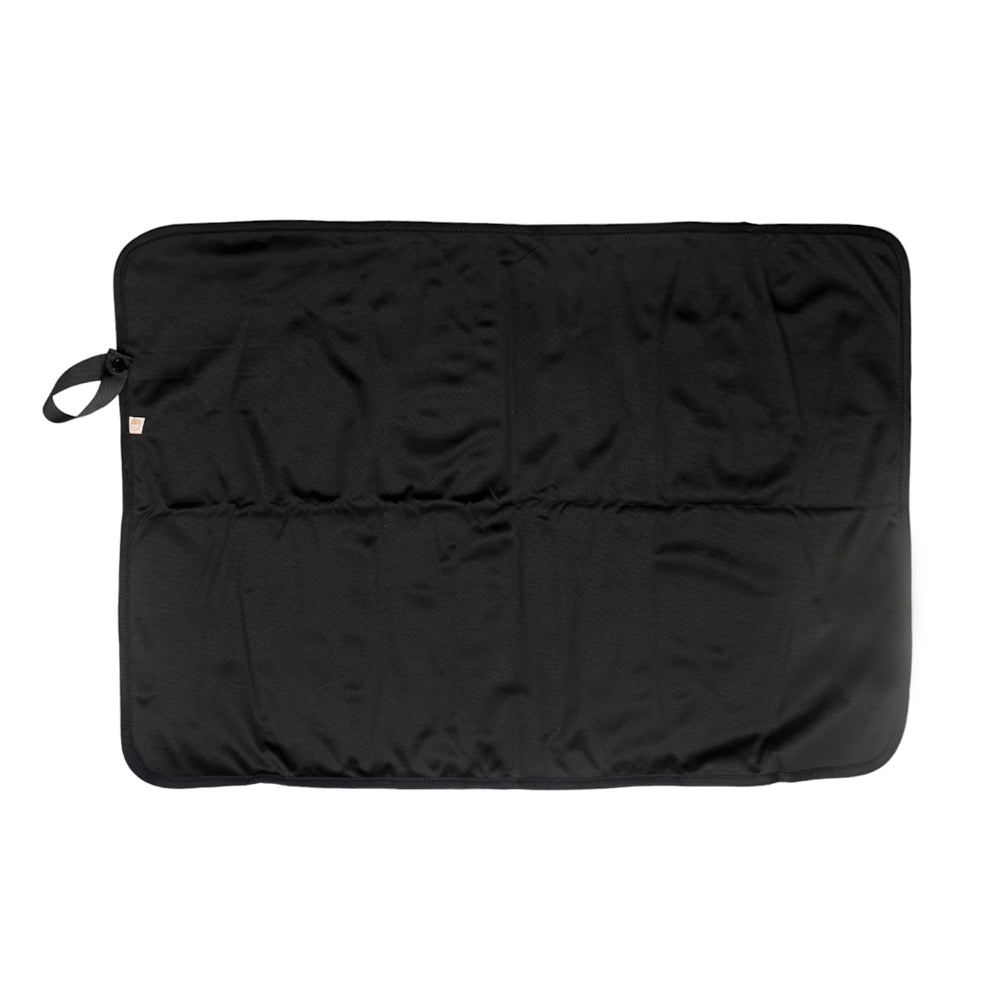 Black out & about change mat on a white background