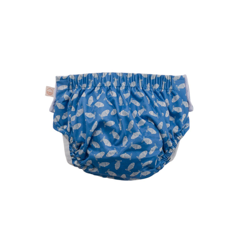 Blue Nestling swim nappy with white fish pattern on a white background