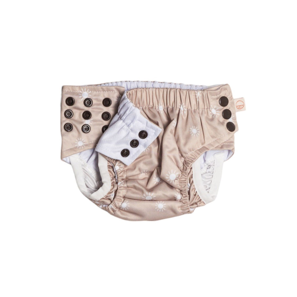 Oat coloured swim nappy with rows of adjustable snaps