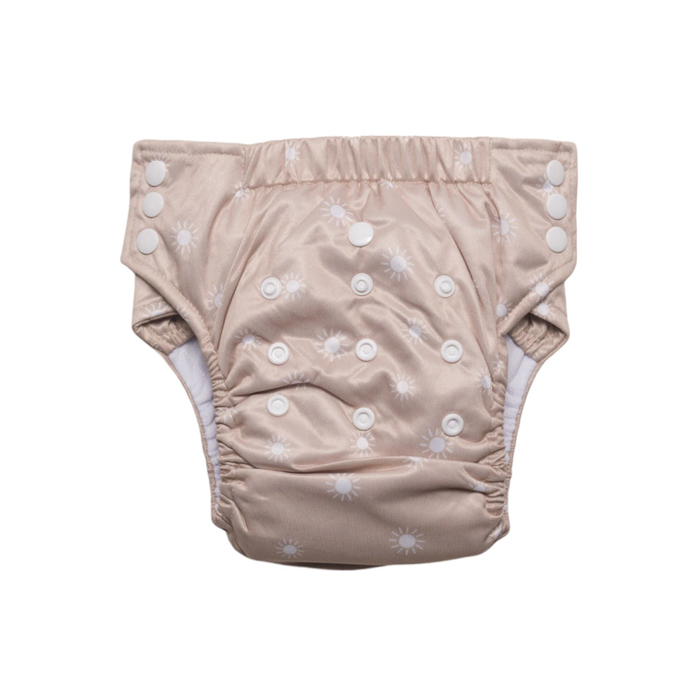 Baby nappy with oat sunshine pattern on a white background
