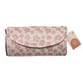 Floral-patterned wet bag with a visible brand tag on a white background