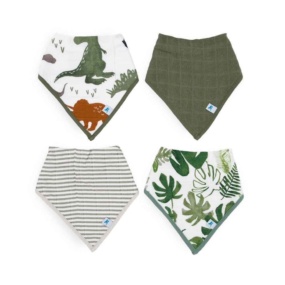 Four cotton muslin baby bandana bibs in fern green, grey stripe colours and tropical leaf and dinosaur patterns on a white background  