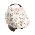 Cotton muslin Floral patterned baby car seat cover on a white background