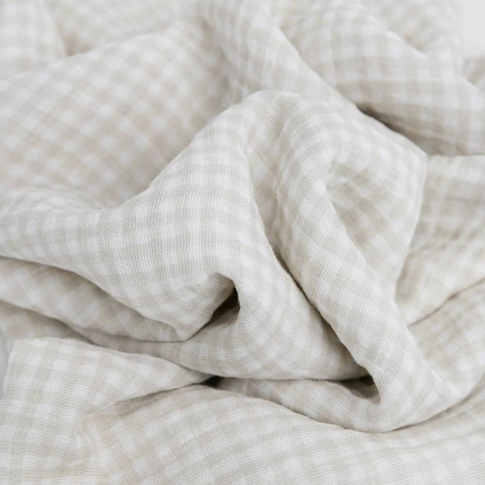 Close-up of beige gingham textured fabric