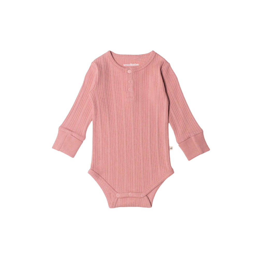 Pink woolbabe baby onesie with long sleeves on a white background