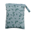 Sage green wet bag with green rabbit pattern on a light blue background