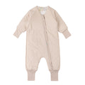 Beige baby sleep onesie with a zipper on a white background