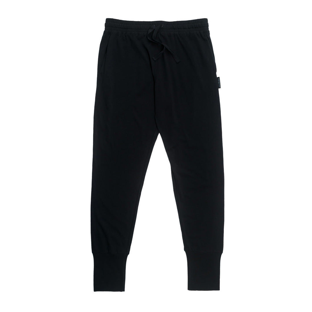 Black merino lounge pants with pockets and drawstring on a white background