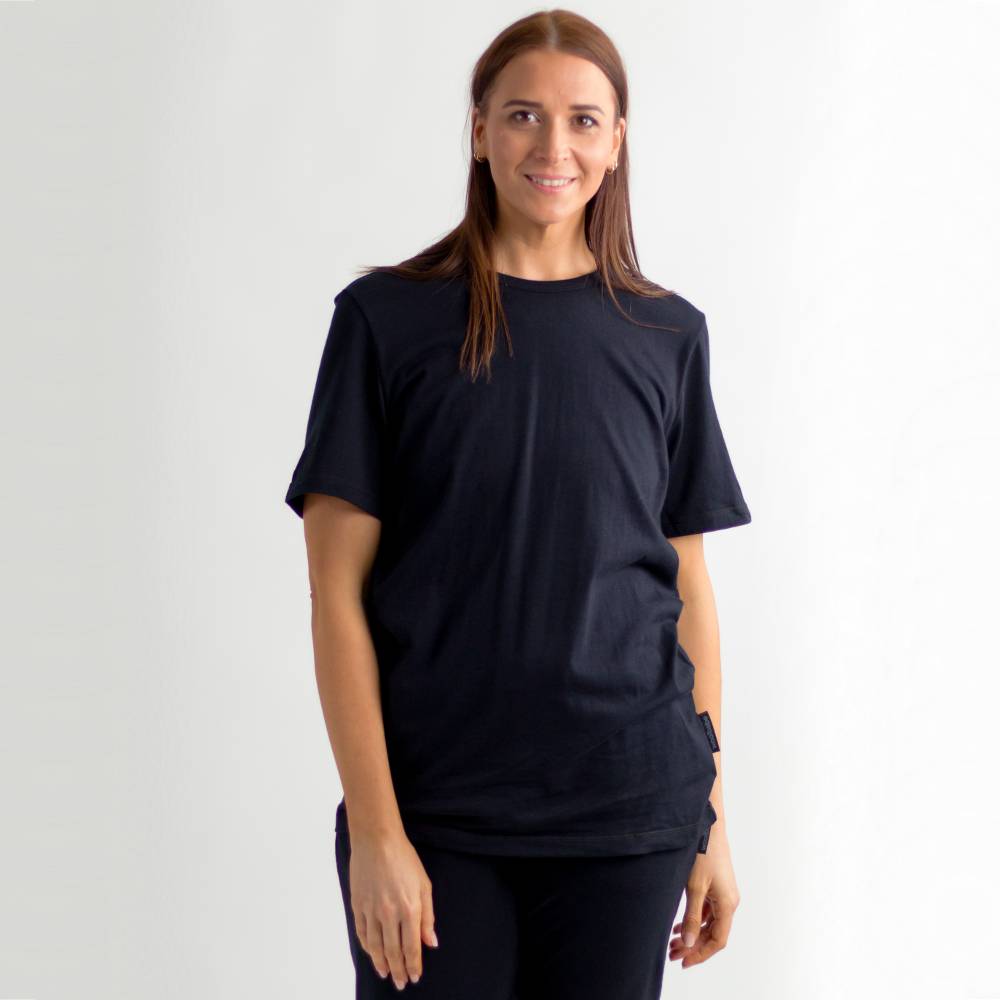 Woman wearing a black PJ Lounge  t-shirt against a white background