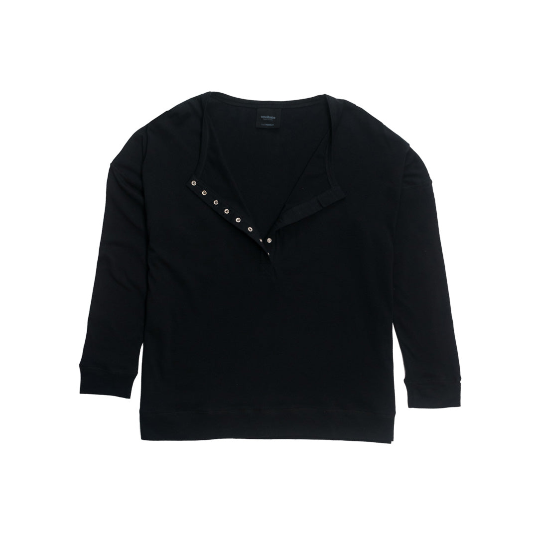 Black long-sleeve top with breastfeeding henley snaps on a white background