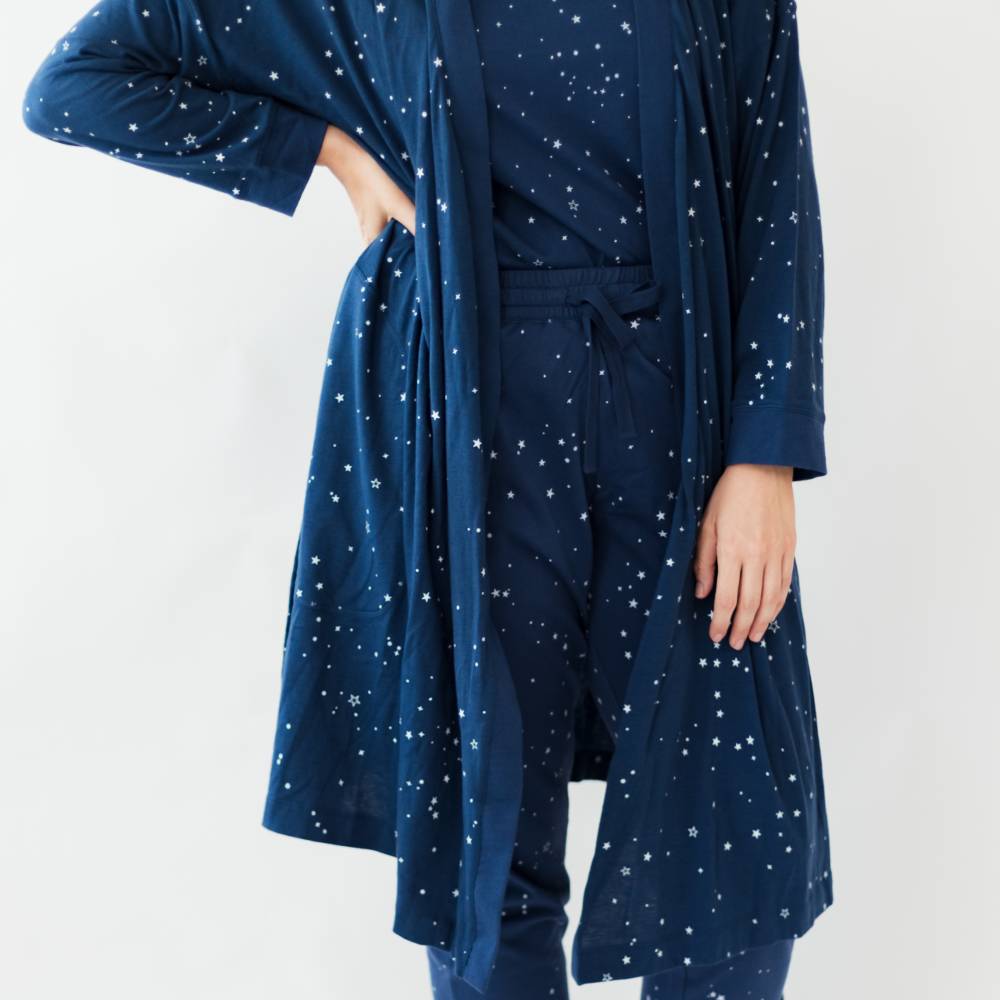 Navy blue robe with star pattern on a white background