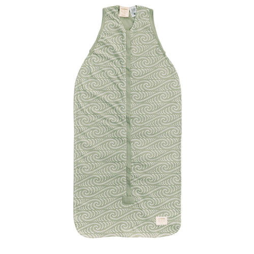 Green Maori patterned summer baby sleeping bag on a white background