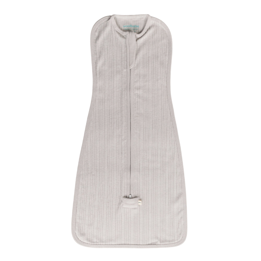 Light gray baby zip swaddle from woolbabe with a subtle pattern on a white background