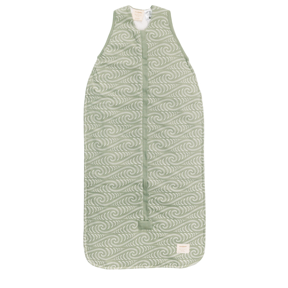 Green maori patterned baby sleeping bag on a white background