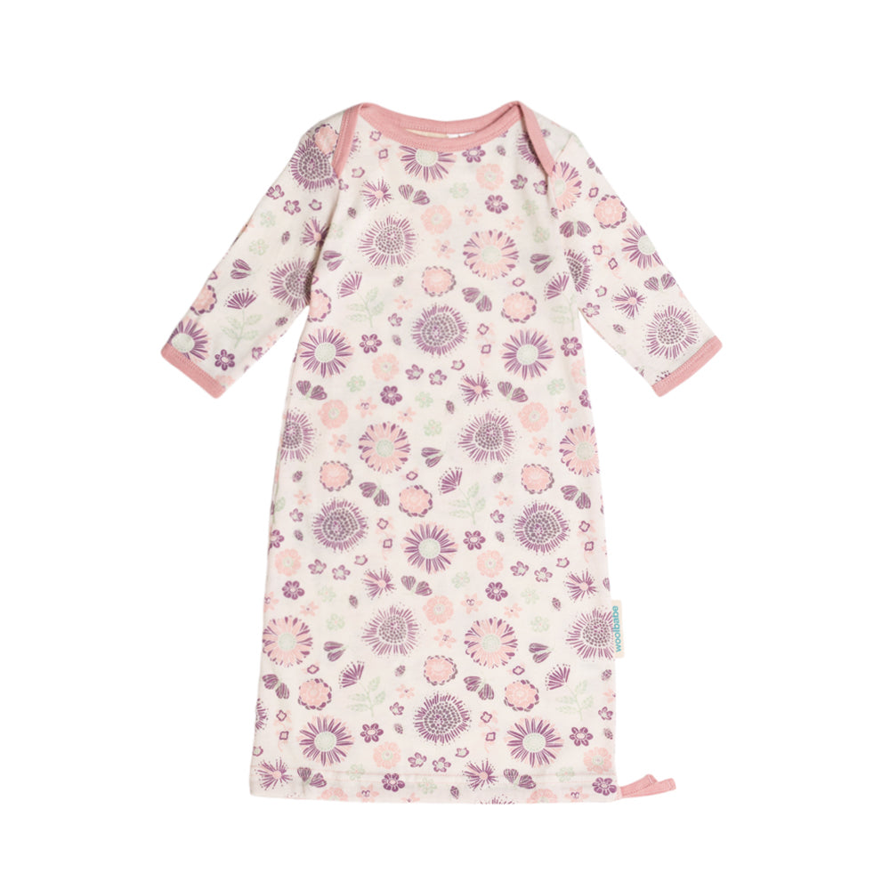 Floral patterned newborn merino baby gown on a white background