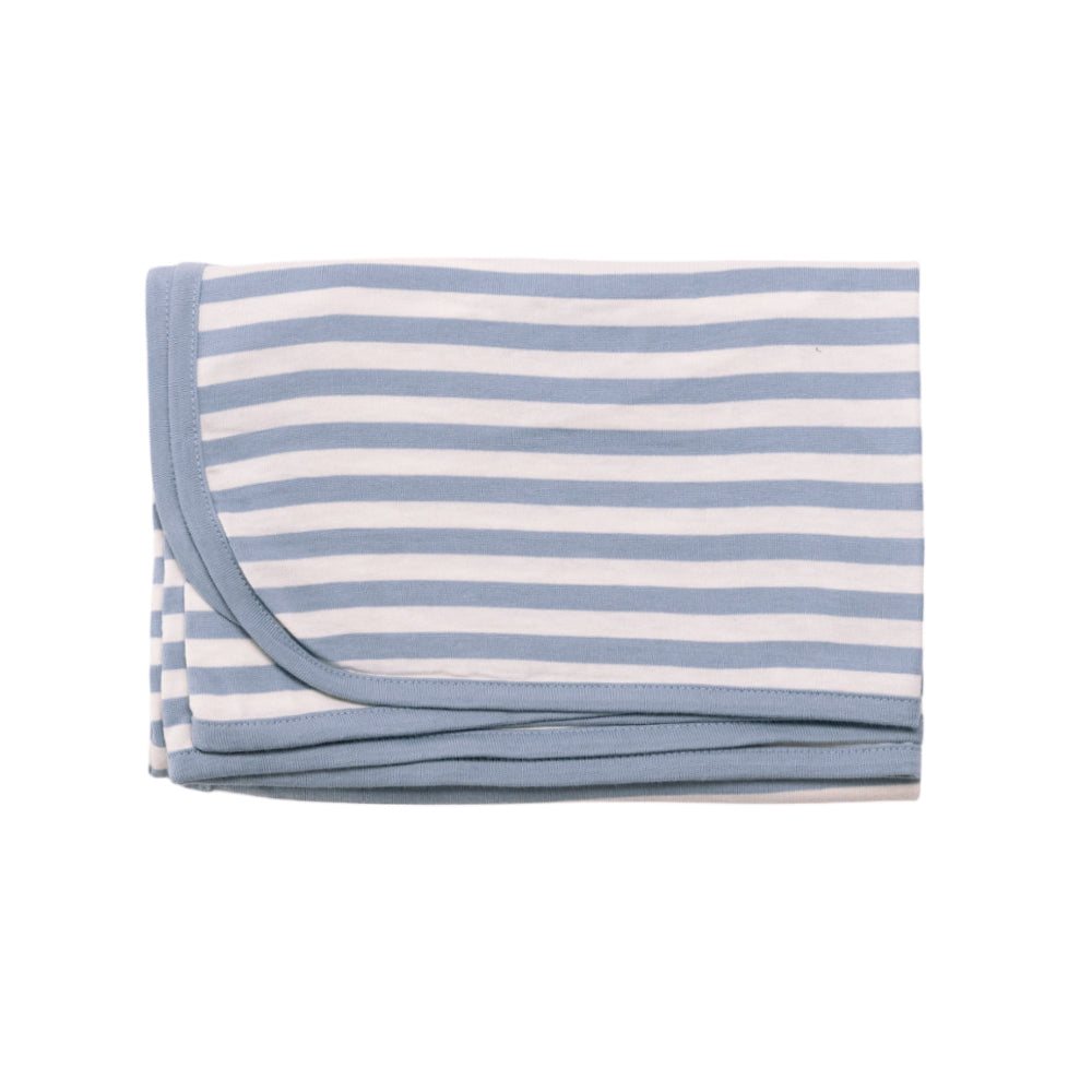 Folded blue and white merino cotton swaddle blanket on a white background