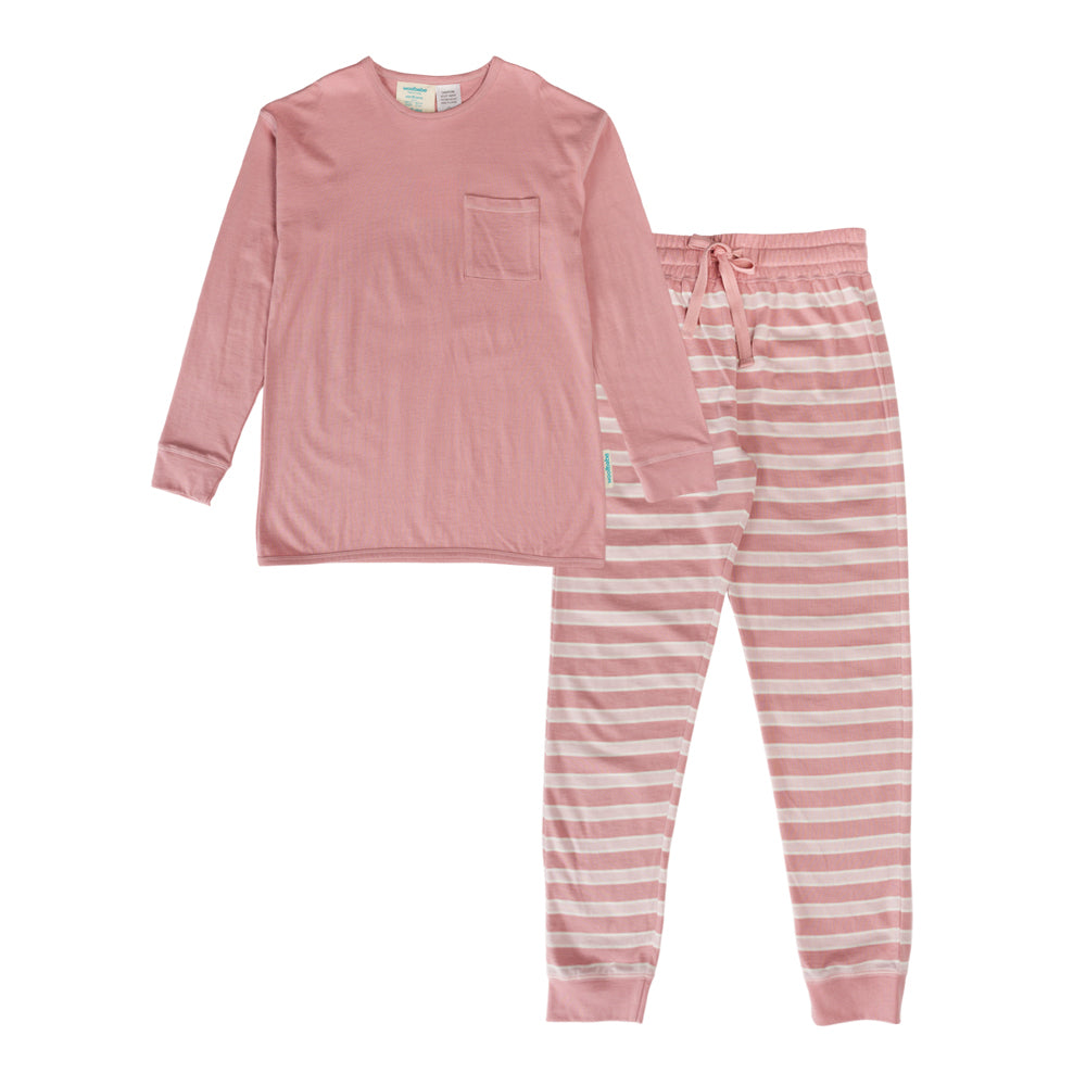 Pink woolbabe teen pajama set with long-sleeve top and striped pants on a white background