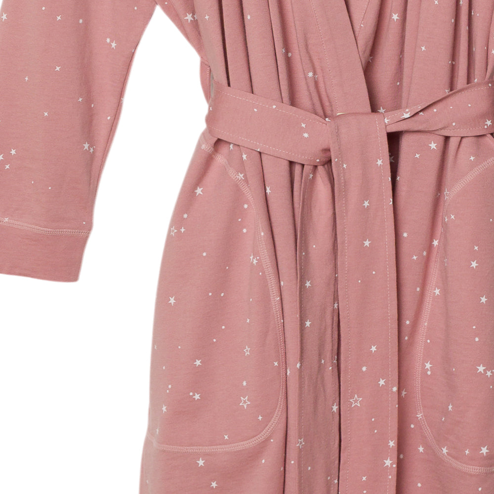Pink robe with star pattern on a white background