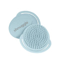 Blue Brush with textured surface and smooth backing on a white background, branded 'shnuggle'.
