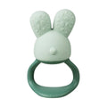 Green rabbit-shaped b.box teething ring on a white background
