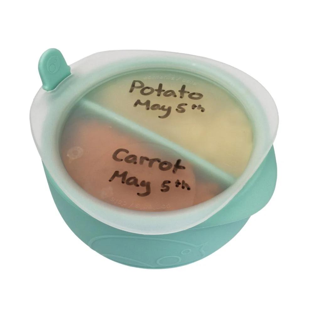 Silicone food container with compartments labeled 'Potato May 5th' and 'Carrot May 5th' on a white background.
