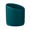 Teal silicone bottle bumper with 'b.box' branding on a white background