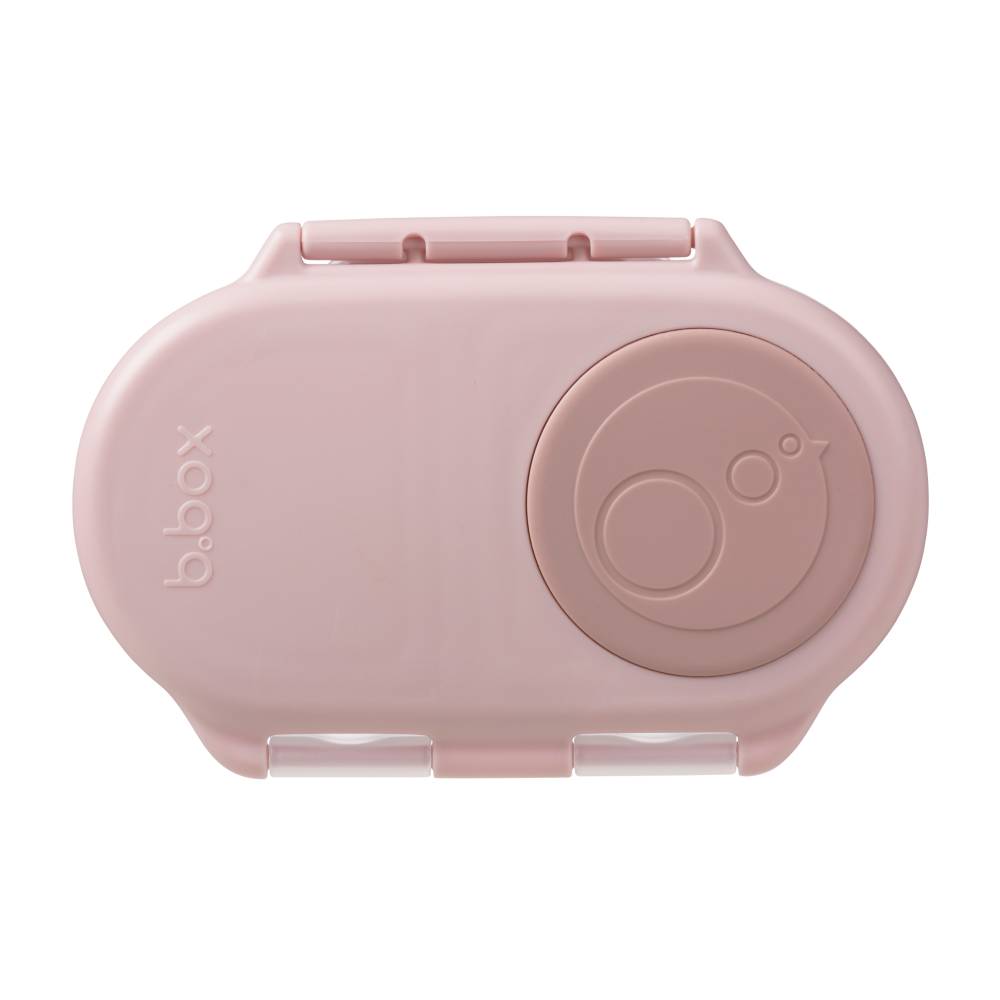 Pink b.box snack container on a white background