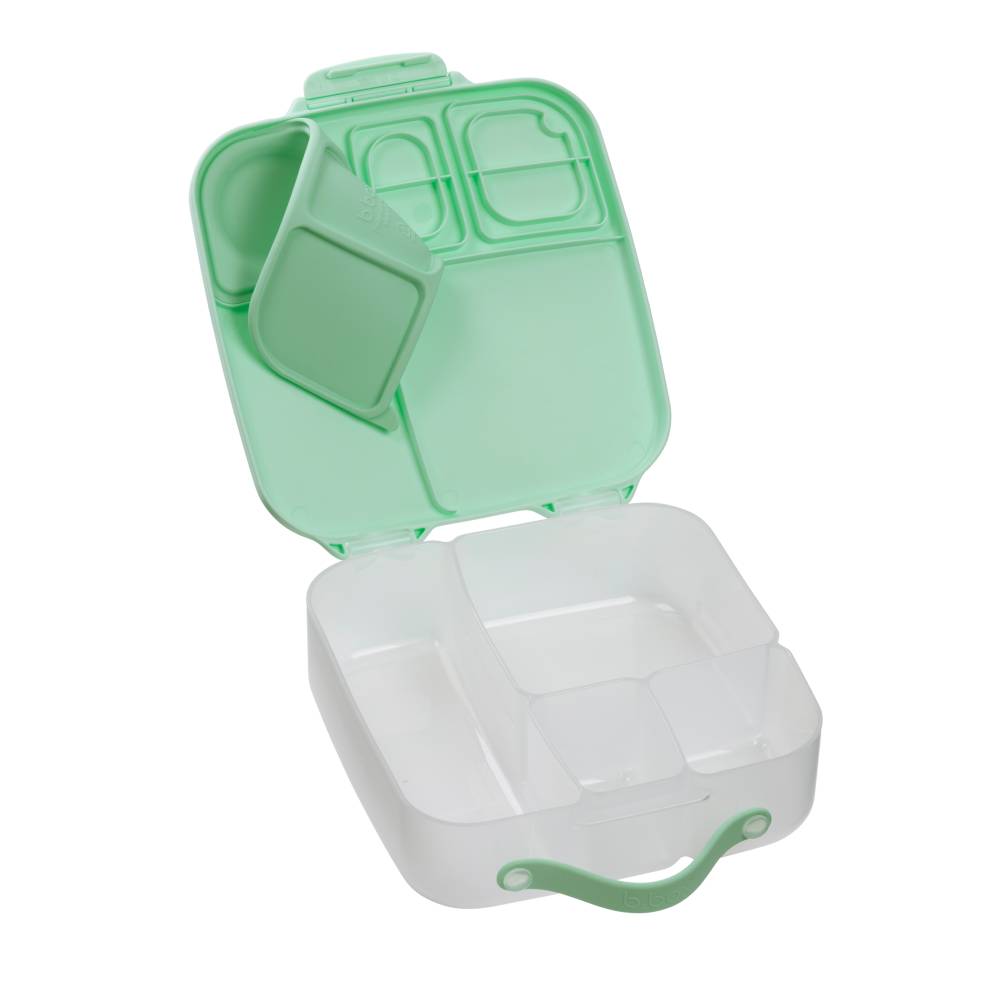 Green and white compartmentalized container on a white background