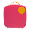 Pink lunch box with orange handle and lid on a white background