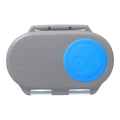 Gray snack container with a blue silicone lid piece featuring the b.box logo on a white background