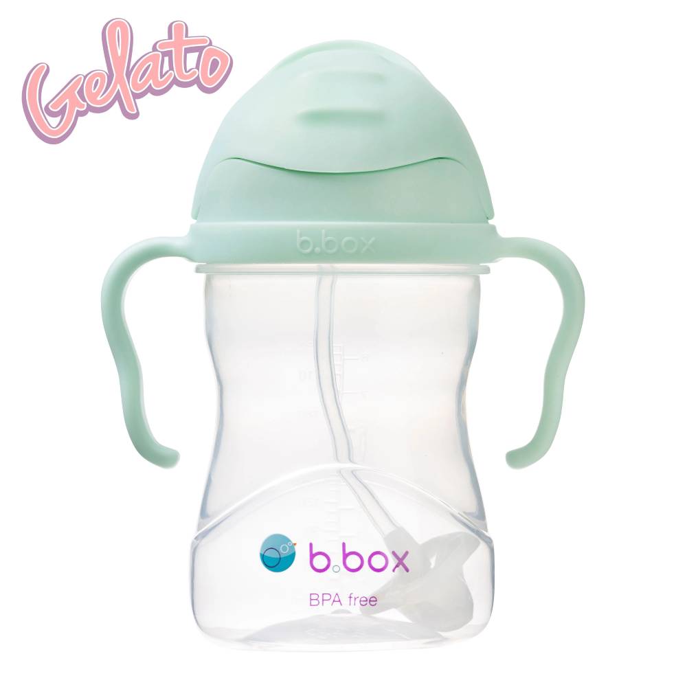 BPA-free sippy cup with green lid and handles on a white background, featuring the brand 'b.box'.
