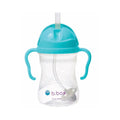 Clear sippy cup with turquoise handle and lid on a white background