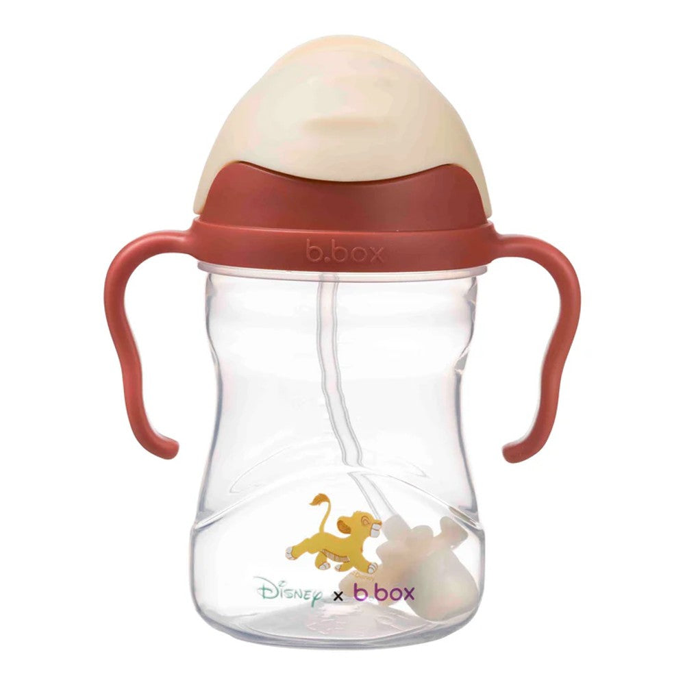 Clear sippy cup with red handles and beige lid on a white background, featuring Disney x b.box branding.