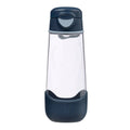 A clear plastic water bottle with a dark navy blue flip-top lid and matching navy blue silicone base sleeve, shown on a plain white background.