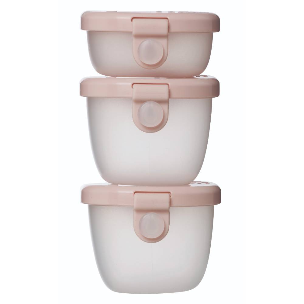 Set of three stacked snack tubs with pink lids on a white background
