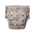 Beige reusable toddler pull-up style nappy with rabbit pattern and gray buttons on a white background