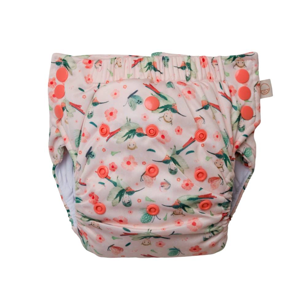 Reusable Nappy pant in pink Hummingbird design with snaps on a white background