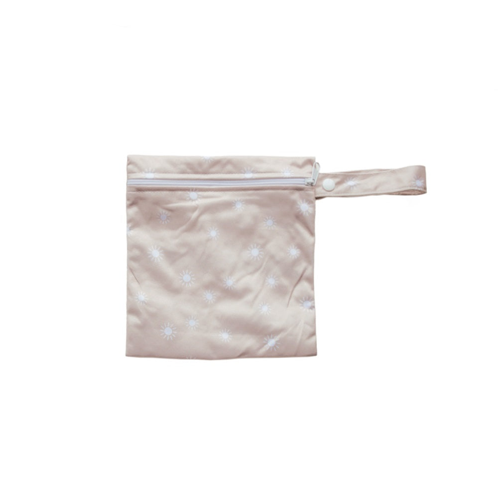 Mini oat sunshine print wet bag with zip on a white background