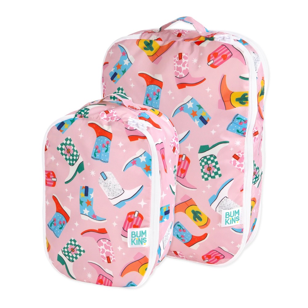 One large and one small bumkins packing cube with pink base and colourful cowboy boot pattern. Small handle on top and white zipper on a white background 