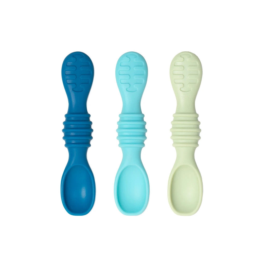 3 silicone spoons in blues and green on a white background