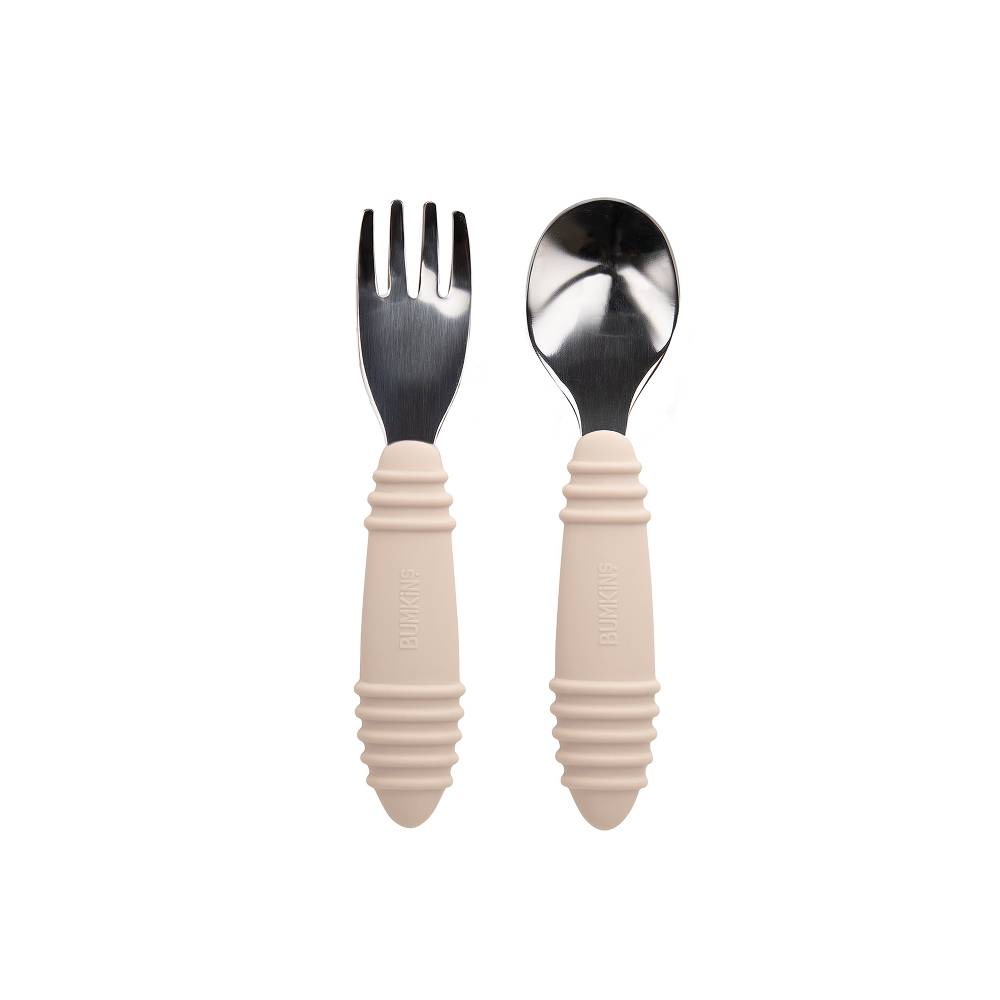 Stainless steel spoon and fork with sand silicone handles on a white background