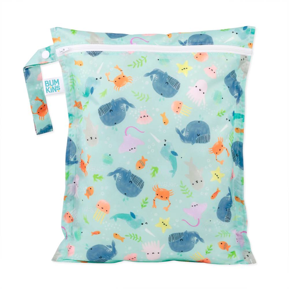 Bumkins wet bag with a ocean design on a white background