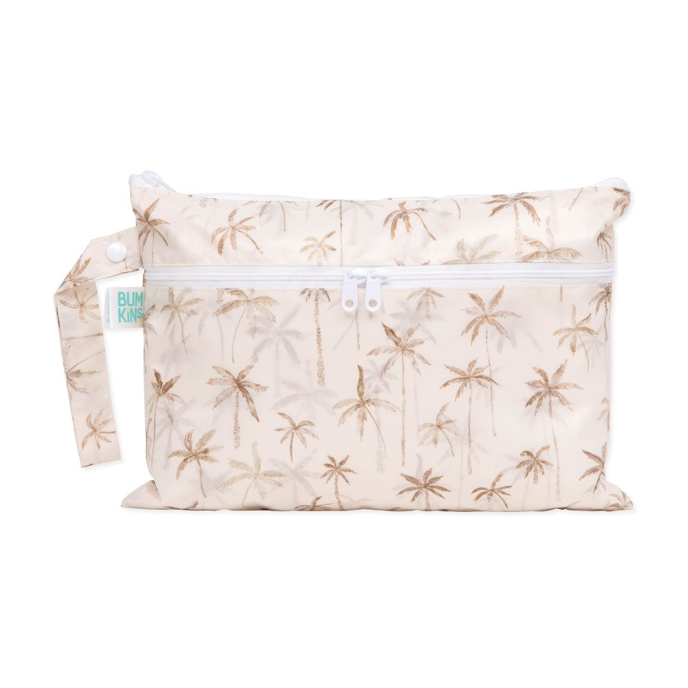 Bumkins beige wet/dry clutch with palm tree pattern and visible brand tag on a white background