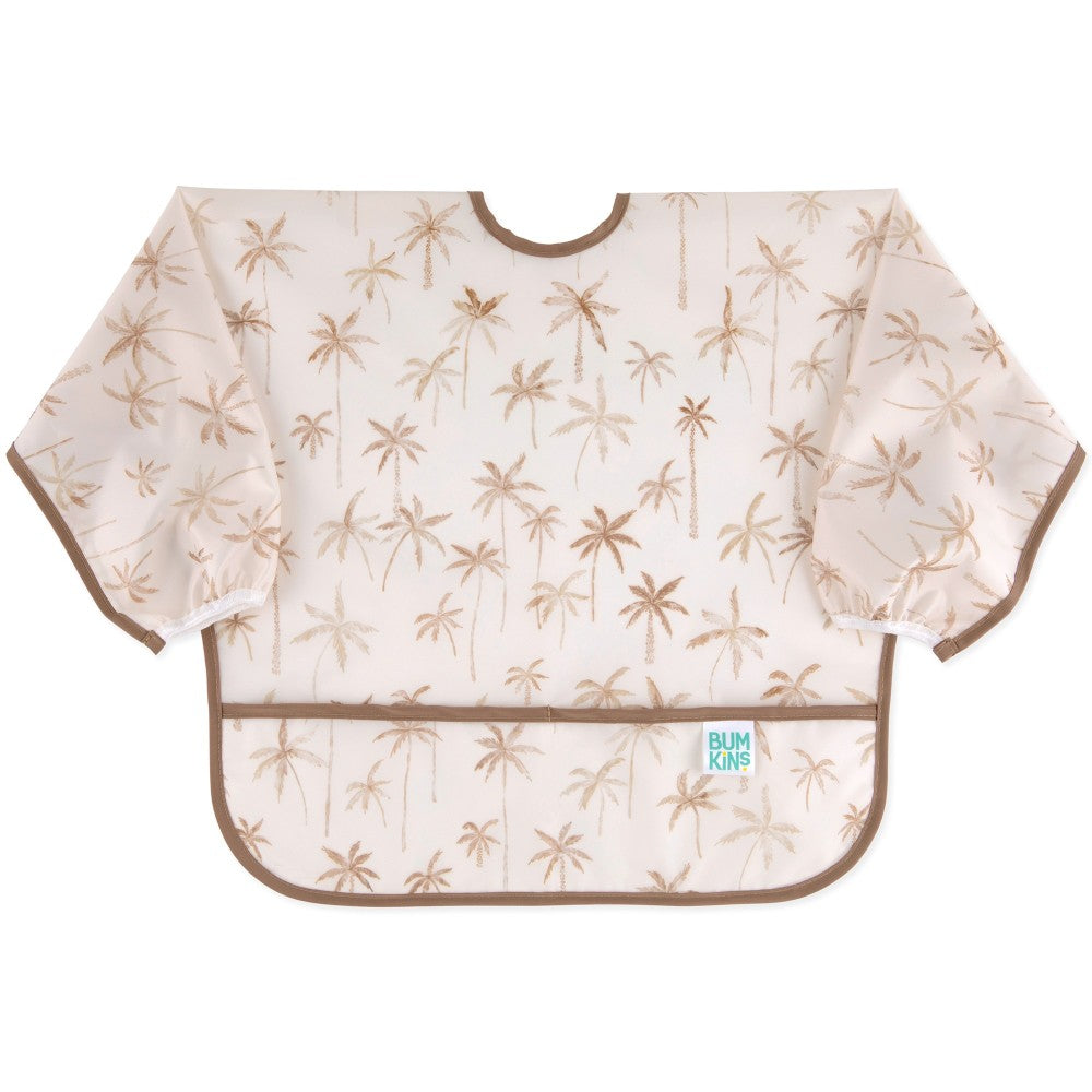 A long sleeve bib with elasticated wrists and front pocket in palm daze pattern and bumkins tag